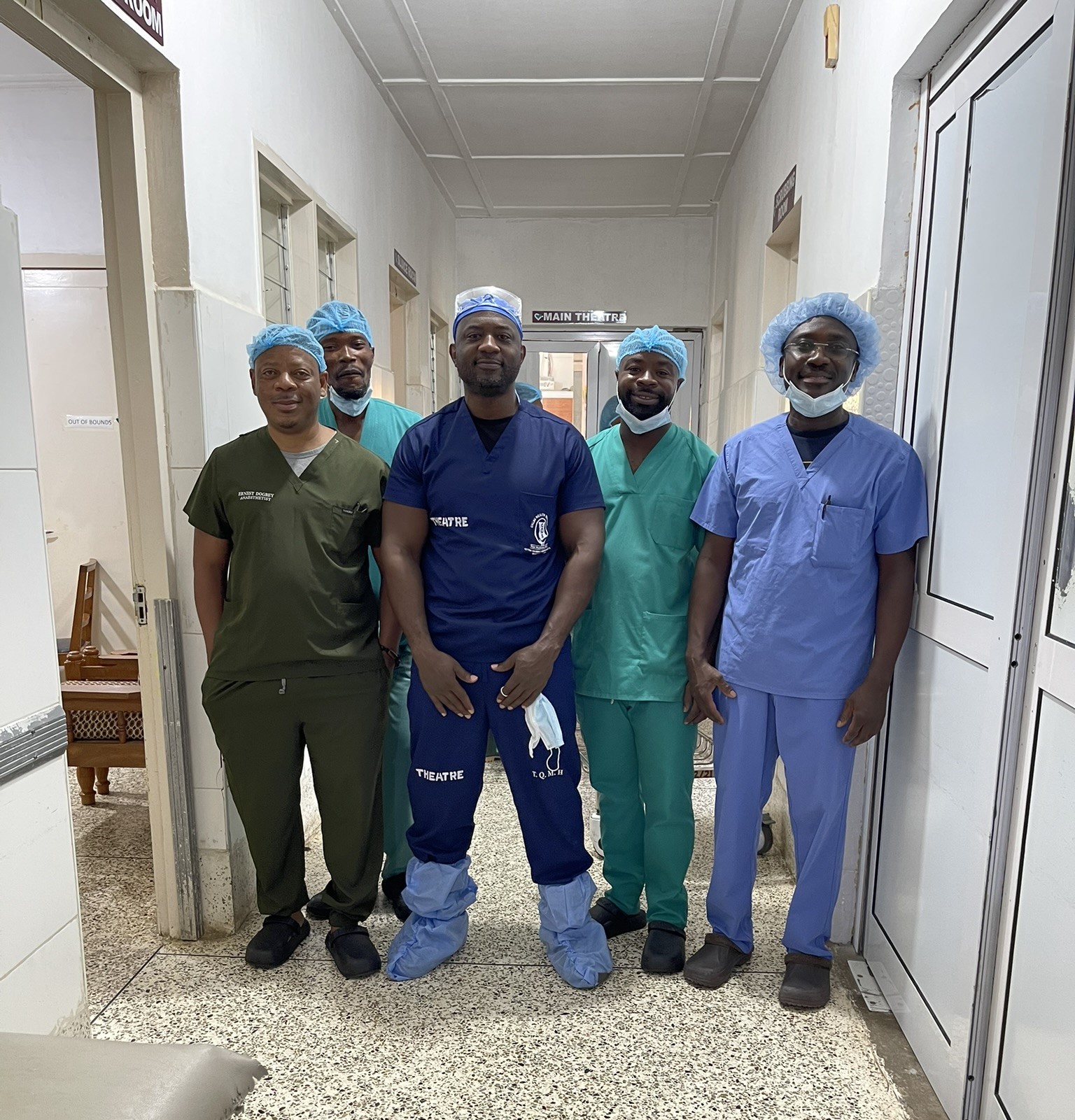 A healthcare team standing together at a hospital.